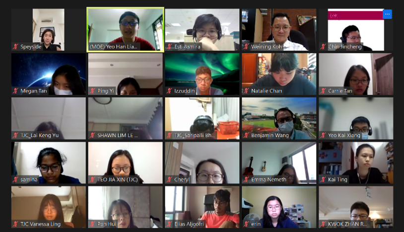A video call grid showing approximately 25 participants with name labels visible on each tile.